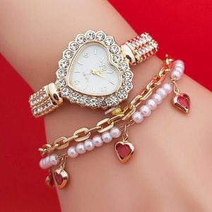Fashionabla och personlig diamant inlagd kvinnors klocka hjärtformad strass mode kvartsarmband klocka