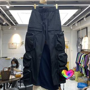 Calças masculinas 2021 3D Multi Pocket Cargo Pants mens de alta qualidade arrastando calças esportivas de zíper rastrear o logotipo bordado Y240522