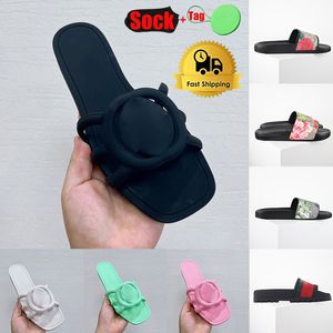 Designer tofflor för män kvinnor mode klassiska platt sommarstrandskor man scuffs läder gummi platta blommiga blommor glidspolar dhgate claquette sandaler