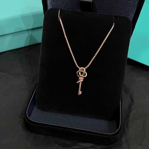 Designer's New Woven series mini pink diamond key necklace for womens Instagram versatile 925 silver knot collarbone chain