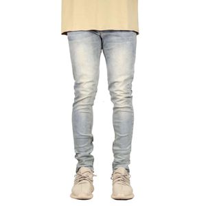 Fashionabla trendig med blixtlåsdekoration, smal passform och nödställda mäns jeans M524 65