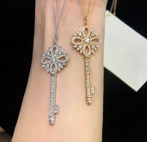 Designer's High Version Brand Snowflake Key Necklace with Diamond Full Iris Sunflower Pendant Sweater Chain for Women