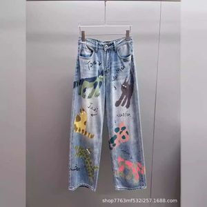 Grundläggande avslappnade klänningar sommar nisch design amerikansk graffiti tecknad katt bokstav tryckt jeans