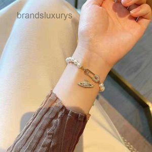 Designerarmband Luxury Jewelry Planet Full Diamond Pin Pearl Armband Womens Fashion European och American Classic Light Luxury Hand Accessories