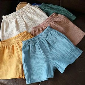 Shorts pantaloncini in lino di cotone per bambini per estate nuovi pantaloni da cinque punti per ragazzi e ragazze pantaloncini traspiranti per ragazze e ragazzi abbigliamento y240524