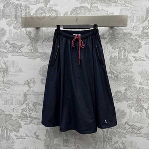 Skirts Designer Brand Nanyou Miu Thin Western Style Age Reducing Casual Breathable Pocket Letter Contrast Drawstring Half Skirt for Women TQT9