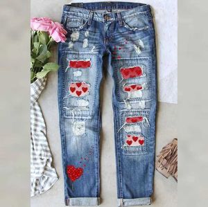 Kvinnors jeans valentines dag diamant hjärta rippade jeans heta försäljning kvinnor rippade tryck jeans mode stretch mager denim penna byxor t240523