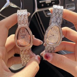 Armbandsur fulla diamant ovala vattentäta armband stålband kvartsur för kvinnors serpentin design urträffar