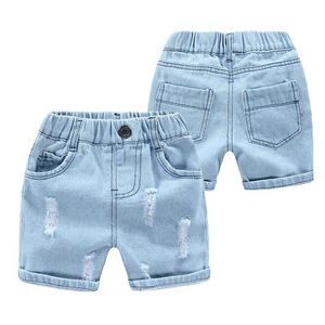 Shorts Summer boy denim shorts fashion hole childrens jeans Korean style childrens casual denim shorts childrens beach pants 2-7 years Y240524