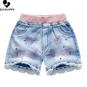 Shorts New 2022 Childrens and Girls Summer Denim Shorts Baby Girls Cute Cartoon Embroidered Lace Shorts Casual Jeans Shorts Y240524
