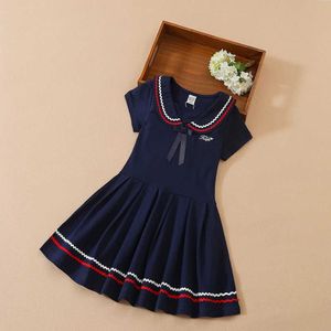Sukienki dziewczynki Zestawy odzieży dziewczyny sukienka szkolna mundur Flip Flip Flar sukienki 5-12-letnia dziecięce odzież przygotowawcza letnie ubranie z krótkim rękawem WX5.23