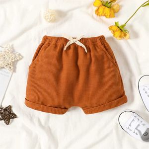 Shorts Baby boy solid waffle elastic waist shorts with soft and comfortable pockets perfect for basic outdoor activities Y240524