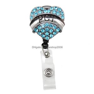 Nyckelringar 20 datorer/Lot Fashion Mix Style PCT Nurse Ambance Tooth Rhinestone Badge Reel för tandläkare Drop Delivery Jewely DHIB1