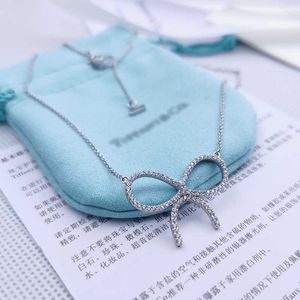 العلامة التجارية المصممة الكاملة قلادة الماس S925 Sterling Silver Bow Necklace Live Broadcast Sweet Clavicle Chain Female Ins Cold Wind