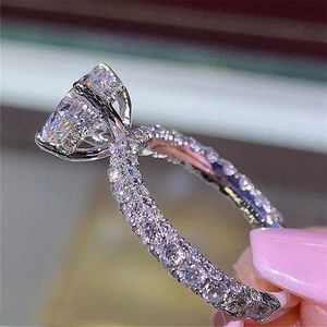 Womens Diamond Ring Romantischer Zirkon leuchten rund Stein Hochzeit Braut Mode Schmuck Ringe für Frauen Khino Khino