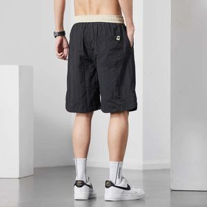 Sport summer dünne Eis Silk Casual Shorts für Männer lose und atmungsaktive tägliche Strandkleidung