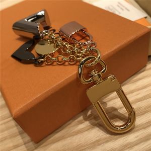 Keychain Luxury Designer Gold Metal Key Buckle Classic Brand Letter Rose Lock Star Pendant Stylish High Quality Keychains Bag Ornament 325R