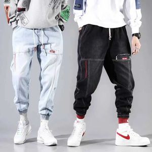 Herrbyxor trendiga jogger mens lastbyxor med lätt denim lastfickor hiphop lös svart kanin klippa jeans mens s-4xl 5xl q240525