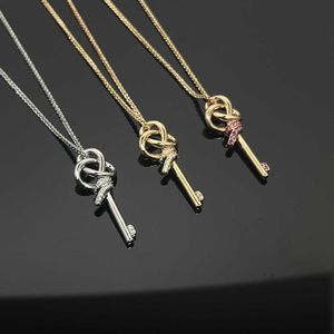 Fashion Brand New Line Entangled Key Necklace Bracelet Earring Ring Womens High end Style Full Diamond Set