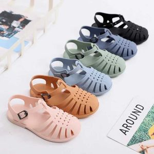 PRIMEIROS PRIMEIROS SUMPLAS SANDALS SANDALS BEBÊ GIRLS CUMDLER SOMENTO NÃO REMPLIOM PRINCESS Sapatos Kids Candy Jelly Beach Sapatos meninos Casual Roman Slippers Q240525