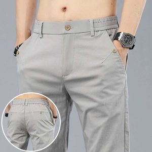 Męskie spodnie 2024 Nowe męskie klasyczne koreańskie solidne letnie 3-kolorowe spodni swobodne spodnie biznesowe elastyczne bawełniane ultra cienkie markę mens spodni Q240525