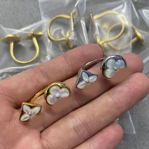 Designer ringar elegant pärlemor klöver blommeband ringar 18k guld 925 silverpläterad öppnings justerbar ring för kvinnor fest bröllopsmodesmycken gåva