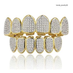 Ice Out зубы Grillz для мужчин Bling Bling Cubic Циркония Хип -хоп ювелирные изделия Золото, вампир Хэллоуин Грильц свободный корабль