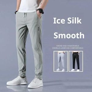 Pantaloni maschili di seta ghiacciata pantaloni maschile maschile estate slim fit 2024 tendenza lavoro coreana pantaloni sportivi traspiranti dritti q240525