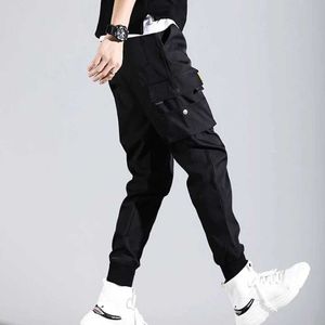 Pantaloni da uomo pantaloni harem pantaloni hip-hop joggers pantaloni cargo nastri tascabili pantaloni sportivi q240525