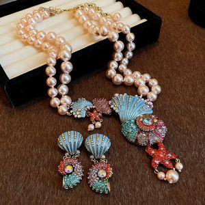 Crystal Pearl Conch podwójnie warstwy Naszyjne kolczyki retro przesadzony wzór łańcucha swetra biżuteria hurtowa akcesoria 240511