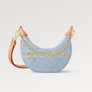 Explosion new Women's Loop M24846 Sky Blue Denim Front zipped pocket Circle zip fastener stylishly fresh half-moon shape gold-color chain leather strap Designer top