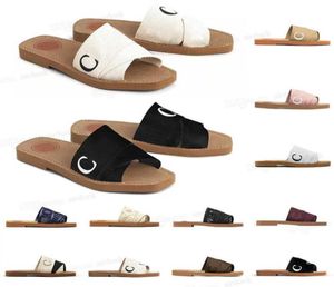 Designer sandali legnosi per donne muli vetrini piatti abbronzatura leggera beige bianca bianca in pizzo rosa lettere in tela slittatori femminili s1012245