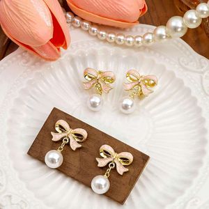 Pink bow pearl with ear clips fashionable and versatile trend earrings new Korean internet celebrity personalized earrings rings rings