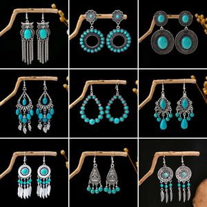 style turquoise Ethnic hollowed out circular flower tassel earrings owl water drop earrings