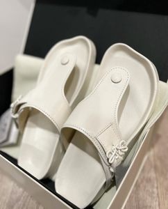 Designer toffel inomhus läder kvinna loeweshoes bruna thong sandaler lyxys sommar lady soliga män pool strand glida kvinnor loewesneaker flip-flops med låda storlek35-45