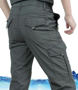 Mężczyźni Letni spodnie oddychające długie spodnie Lekkie wodoodporne szybkie suche spodnie Smukły Wojskowe spodnie taktyczne Mężczyzna 28310303