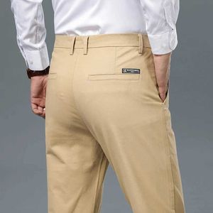 Męskie spodnie 2024 Wiosna/lato nowe męskie spodni luźne i elastyczne męskie przeczesywane bawełniane tkaniny wygodne i oddychające męskie spodnie Q240525