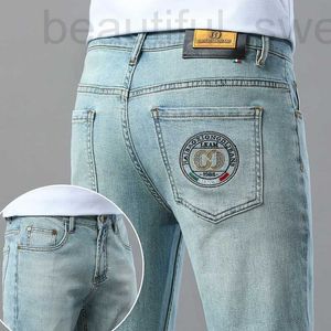 Projektant dżinsów męskich Nowy niebieski europejski towar wiosna i letnie szczupłe stopy elastyczne spodnie Casual Trend Bvuy