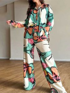 Pantaloni da due pezzi da donna 2023 set di pantaloni lunghi camicia stampare due pezzi set per donne gambe larghe per pantaloni per le gambe ampie vestiti di moda casual slve a due pezzi abiti t240523