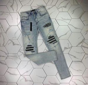 Ph387 Ny personlighet mode broderade byxor något stretchiga jeans trendiga smala hål byxor designer mode märke byxor2176657