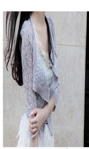 2020 New women039s summer autumn three quarter sleeve lace hollow out crochet patched chiffon short cape coat sunscreen cardiga1841432