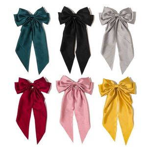 Huvudbonad hårtillbehör Kvinnor Girl Solid Color Long Bowknots Hårklipp för bank Hotellklänning Suit SKOLKÖR DECED Barrettes Fashion Accessories Headwear