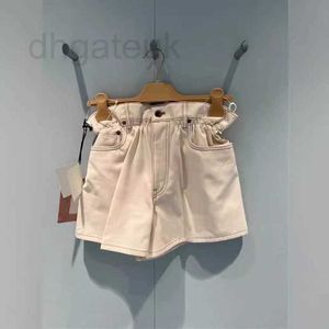 Calça feminina Capris Designer Brand 2024 Primavera/verão Novo broto elástico Broto de flor alta shorts casuais de jeans slim para mulheres wksq