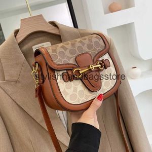 Cross Body Womens Bag 2023 Heiße neue Mode Retro Cross Bag Luxury Damenbeutel Sattel Bag Breite Schultergurt einzelne Umhängetaschen Handtasche H240527