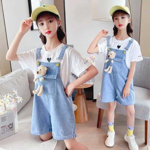 Overaller Rompers 3-10-åriga tjej Pendant Jeans Söt björndocka täcker ny mode koreansk tonårsflicka denim shorts spets födelsedagspresent wx5.26