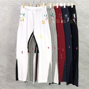 Jesienna zima 22SS Zimowa Europa Splash Ink Patchwork Spodnie Złote druk spodnie Bell-Bottoms swobodne sznurki dresowe mężczyźni kobiety Jogger S 287z