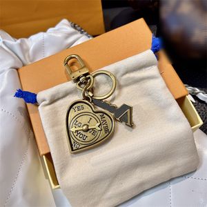 Designer Keychain Borsa Tastiera a sospensione Design orologio a forma di cuore Design Antique uomini di rame da donna Accessorio