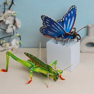 3D -pussel sorterar häckande stapling leksaker barns DIY Handgjorda papperskort 3D Pussel Cartoon Insect Cognition Butterfly Bee Early Learning Toy WX5.26