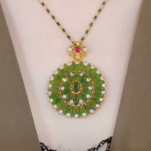 2024High grade green cats eye stone sunflower necklace with imitation jade apple inlay fashionable and versatile clothing pendant