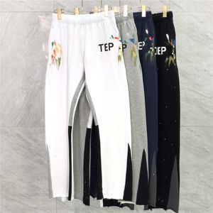 22SS Autumn Winter Europe USA Ręka Splash Ink Slim Patchwork Spodnie Spodnie Bell Bottoms Casual Dripstring Srespants Mężczyźni Kobiety Jogger 352k